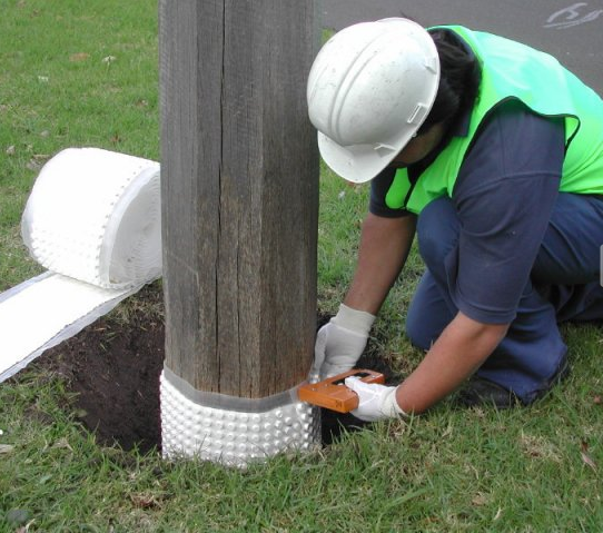 Bioguard Bandage – solid wood preservative discs wrapped in polyethylene bandage for groundline pole protection