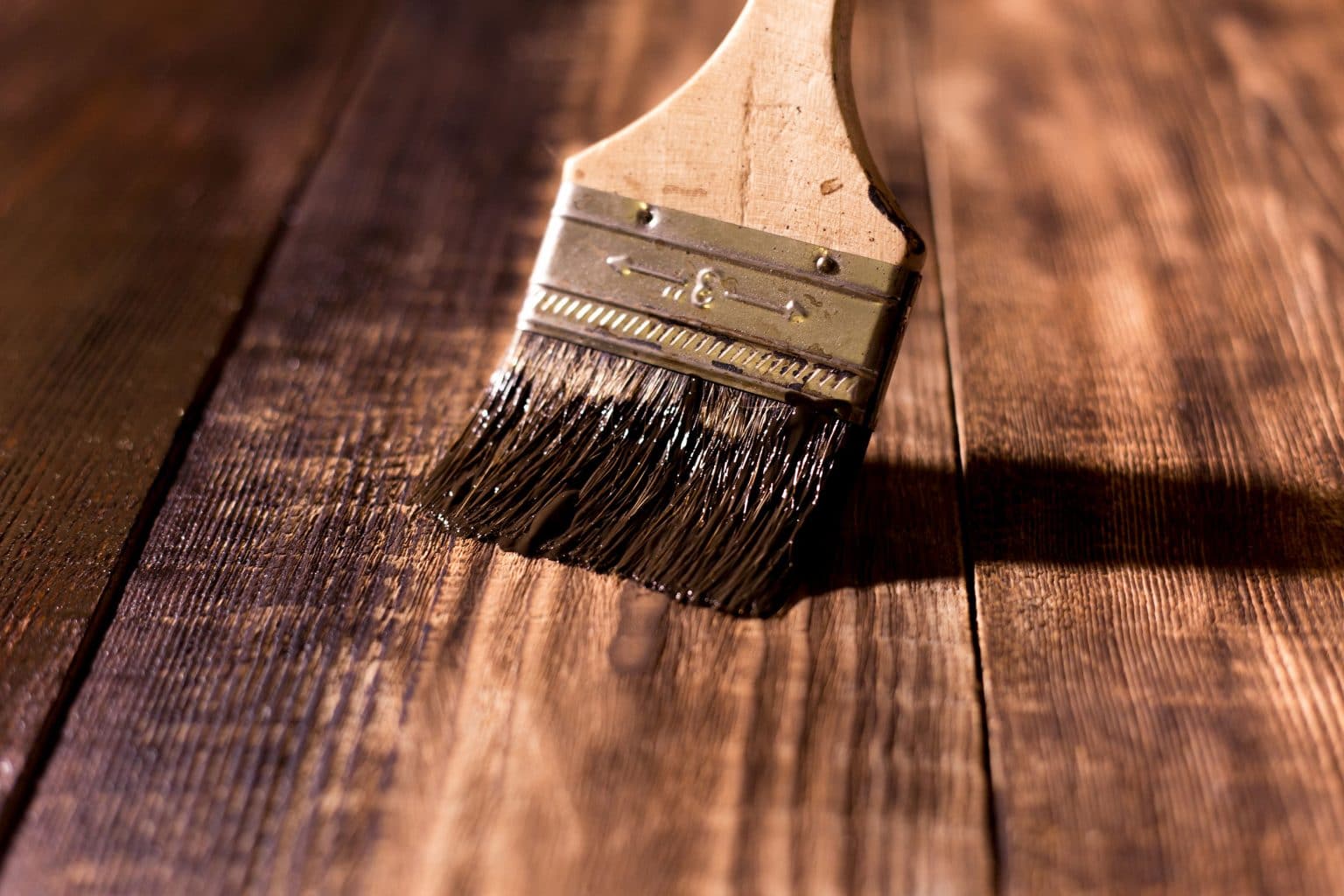 apply aussie clear decking oil with a brush on timber deck